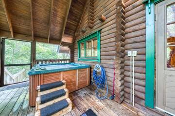 Take a fun relaxing dip in your cabin's hot tub 
